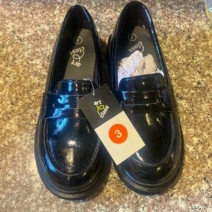 Black penny lofa shoes brand new.